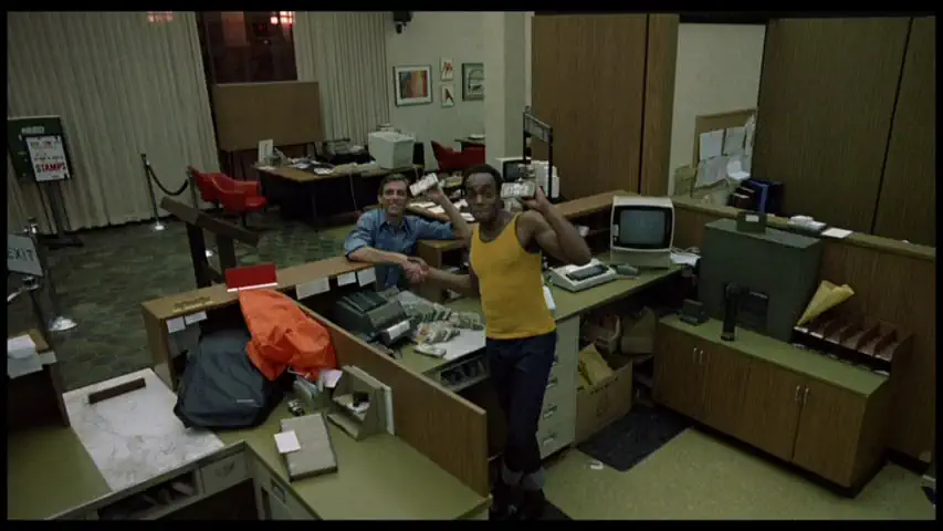 shot of Stephen and Peter taking money from the bank in the mall